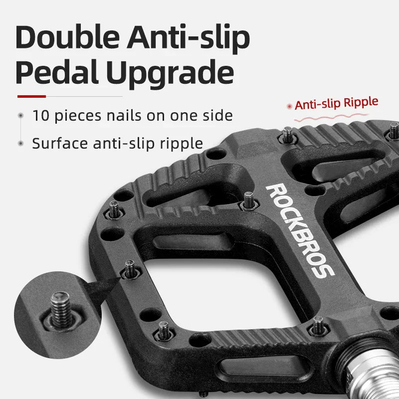 Black ultralight flat platform bicycle pedals made of nylon composite with anti-skid traction pins — view 3