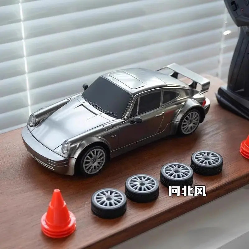 High-speed 1/20 scale RC drift car in durable plastic with remote controller, battery, and road barriers — view 5