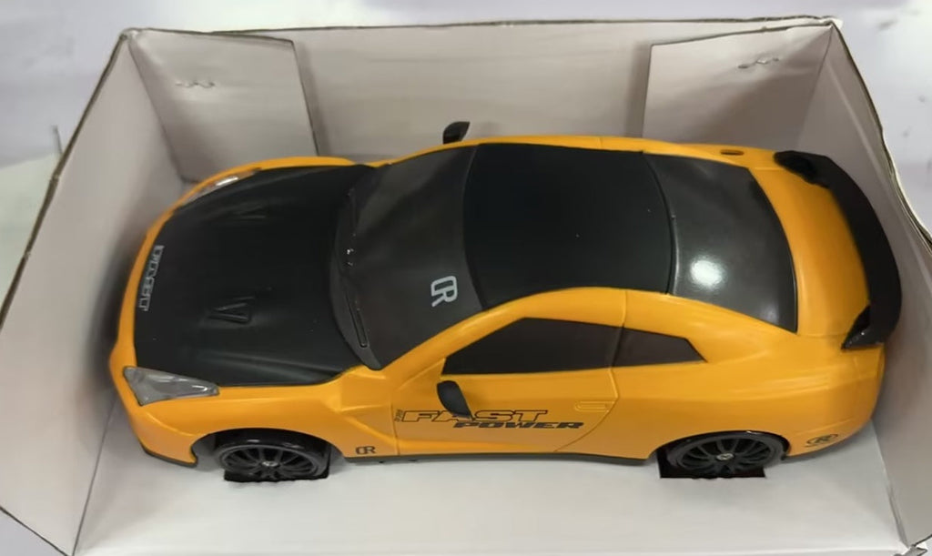 High-Speed 2.4G 4WD RC drift car toy in durable plastic with racing tires and traffic cones — view 3