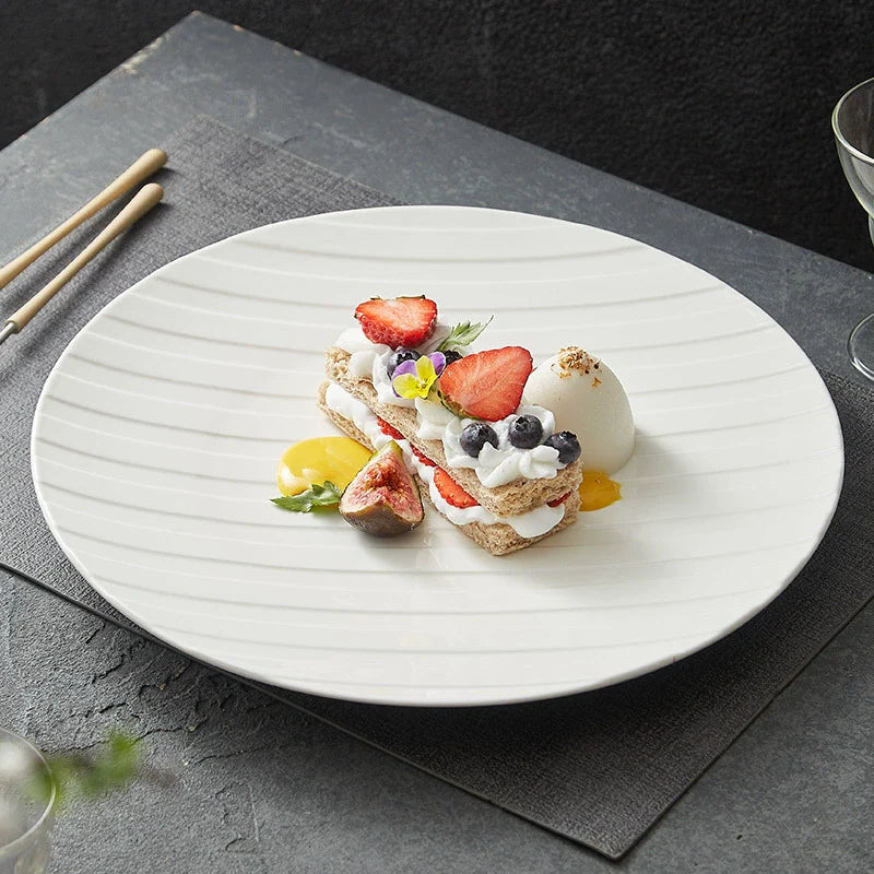 White ceramic plate with diagonal stripe relief texture for elegant modern dining presentations — view 3