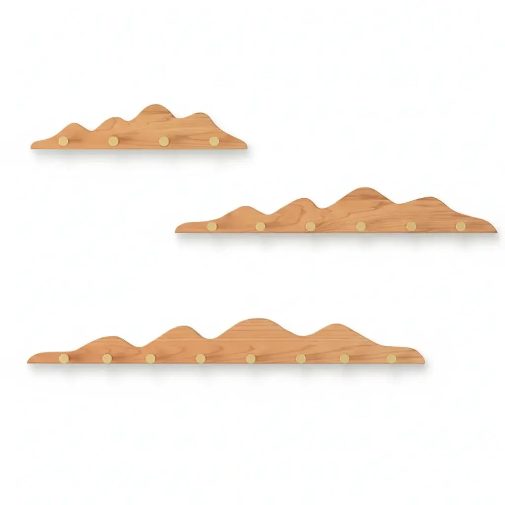Wooden mountain shape wall hook rack with multiple foldable pegs mounted on a white wall — view 5