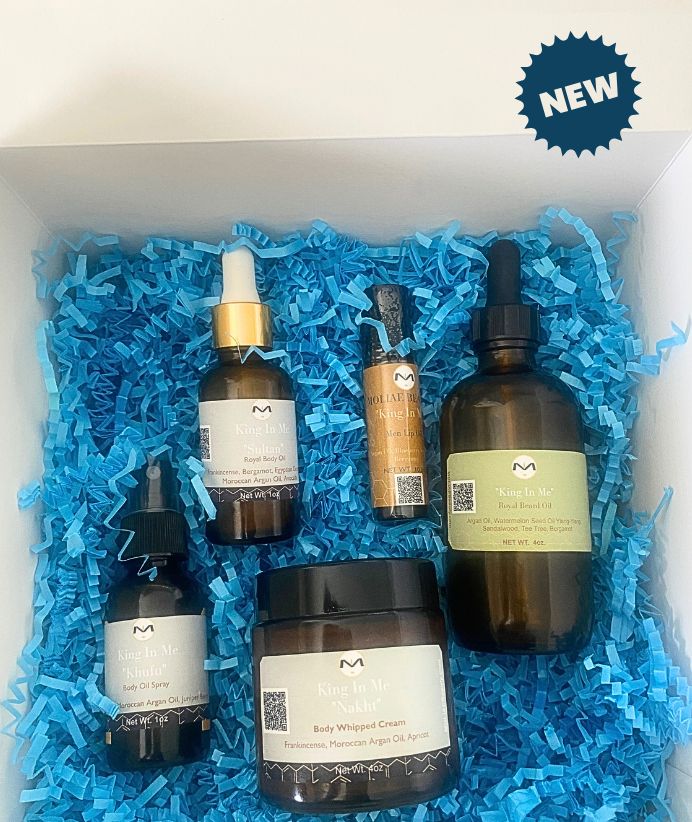Men's luxury grooming gift box with body oil, beard oil, lip care, and body whipped cream