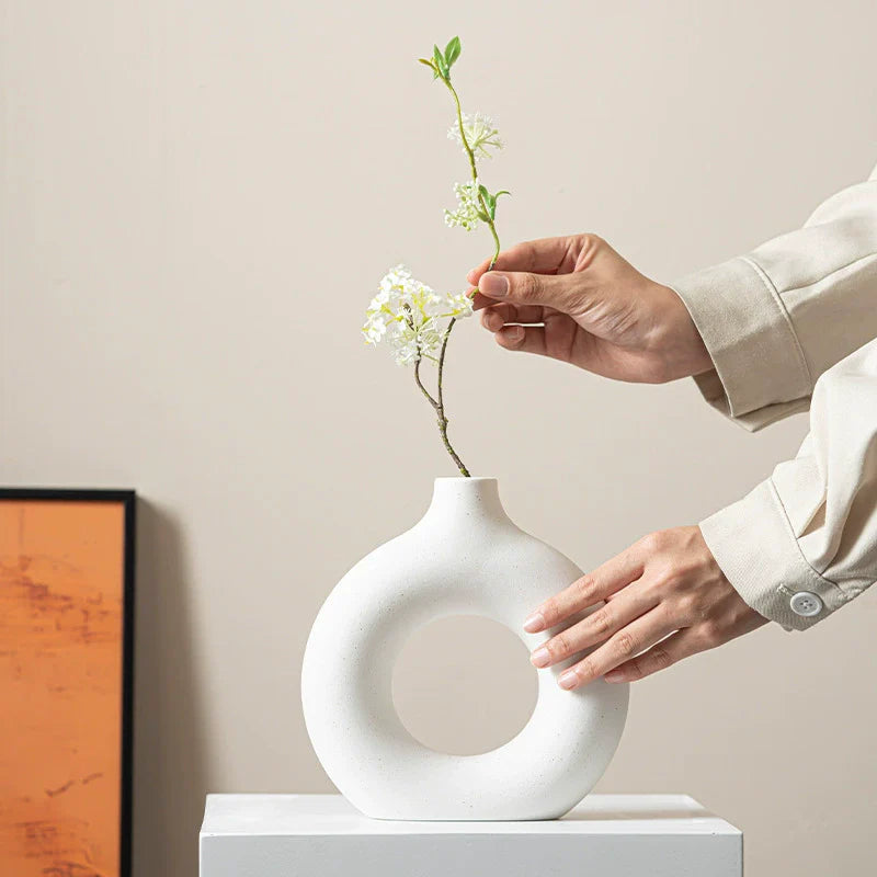 Modern Nordic circle ceramic vase in matte white, minimalist hollow sculptural decor for dried flowers