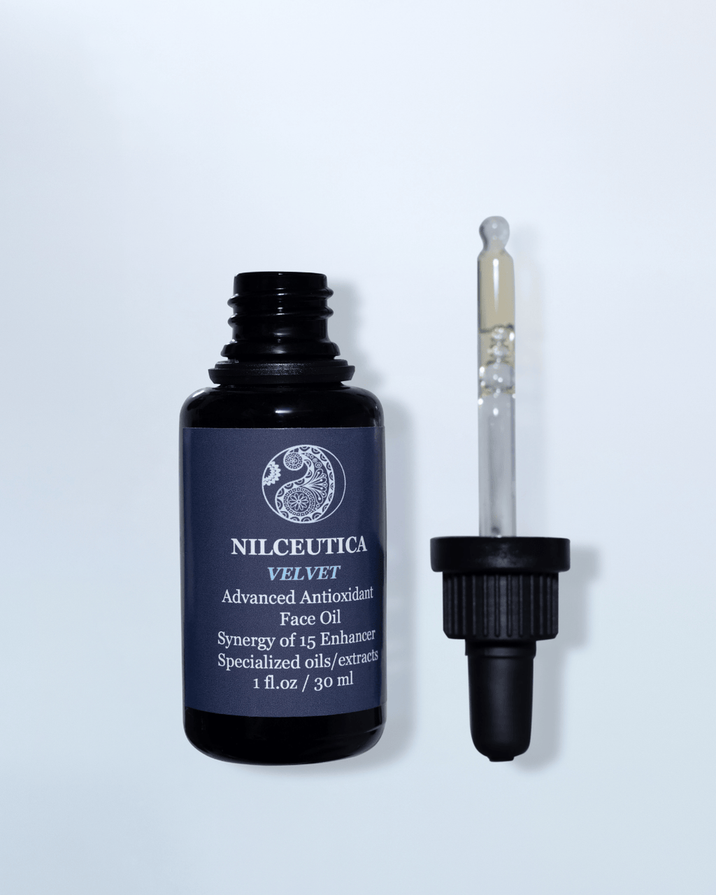 VELVET Advanced Antioxidant Face Oil dropper bottle, a luxurious botanical skincare serum for radiant skin — view 4