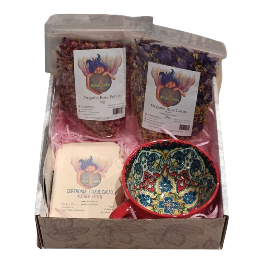 Self-care gift box by Mother Earth featuring cacao, rose petals, blue lotus, and ceramic mug