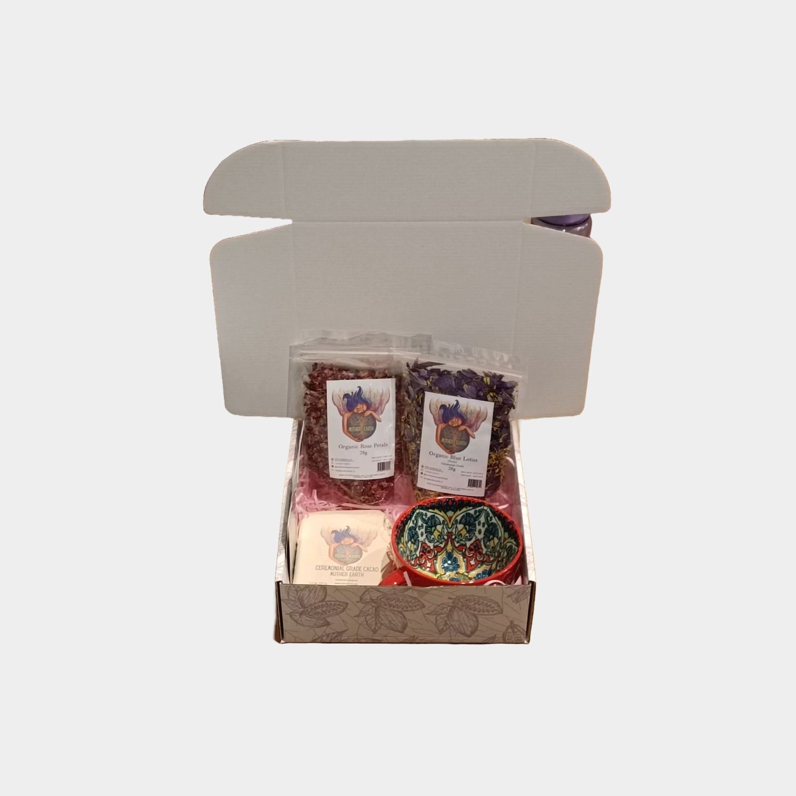Self-care gift box by Mother Earth featuring cacao, rose petals, blue lotus, and ceramic mug — view 4