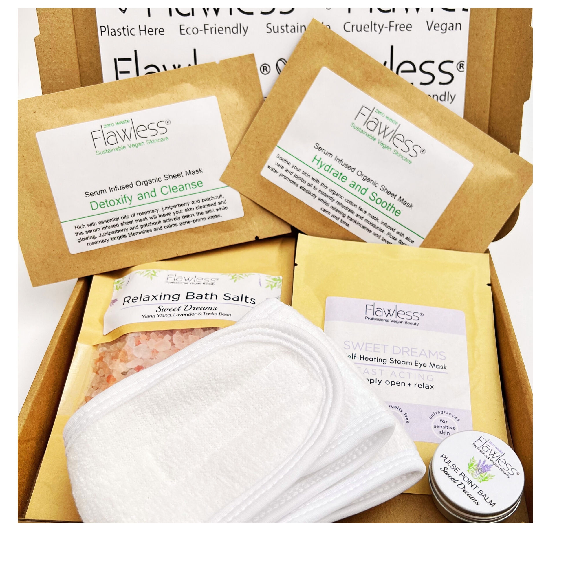 Eco-friendly letterbox self care gift set featuring bath salts, eye mask, facial mask, and balm
