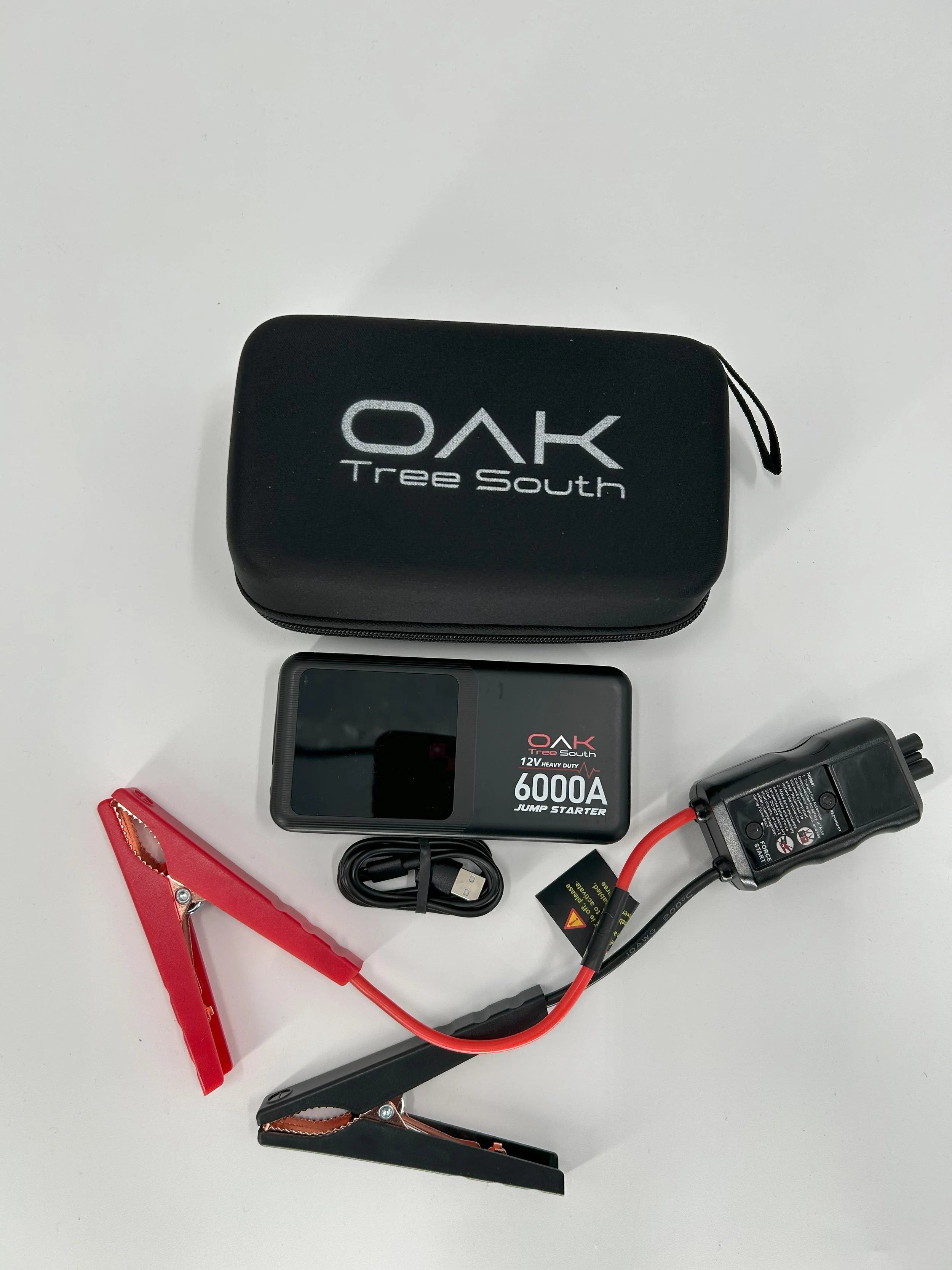 Heavy duty 6000A portable battery jumper pack with multiple charging ports and integrated LED flashlight — view 8