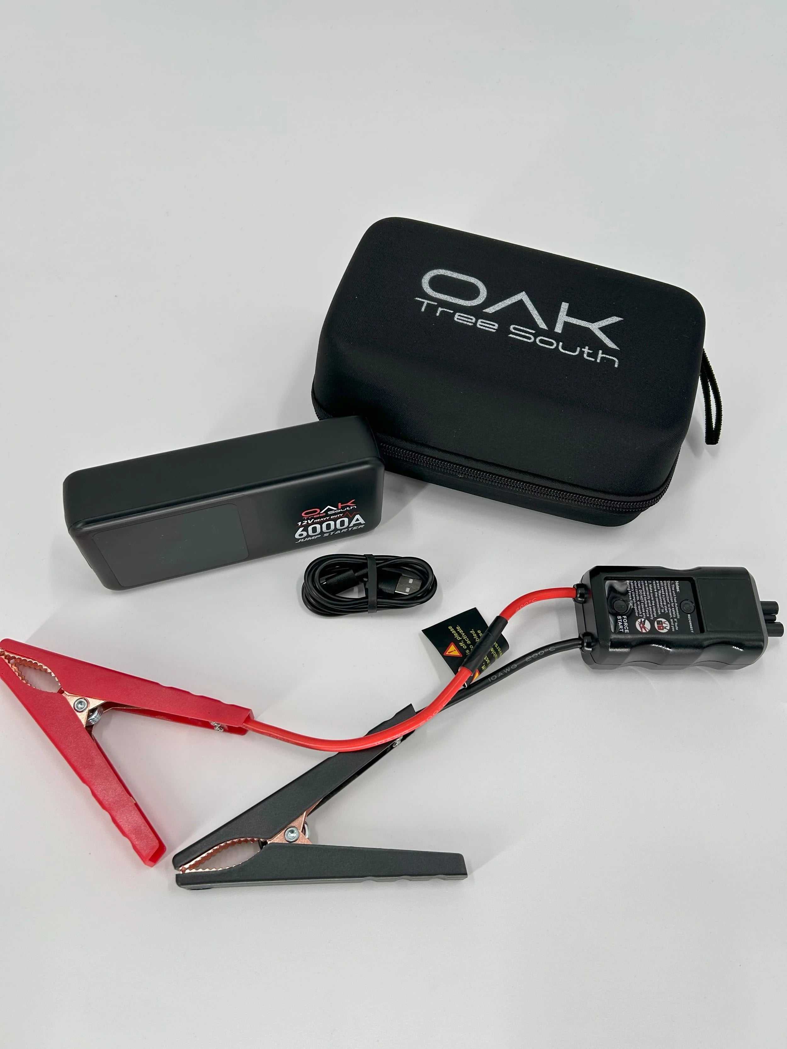 Heavy duty 6000A portable battery jumper pack with multiple charging ports and integrated LED flashlight — view 11
