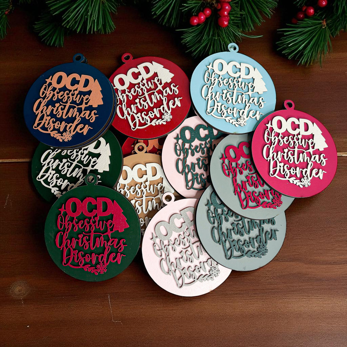 Obsessive Christmas Disorder round wooden ornament with a 3D tree and snowflakes — view 3