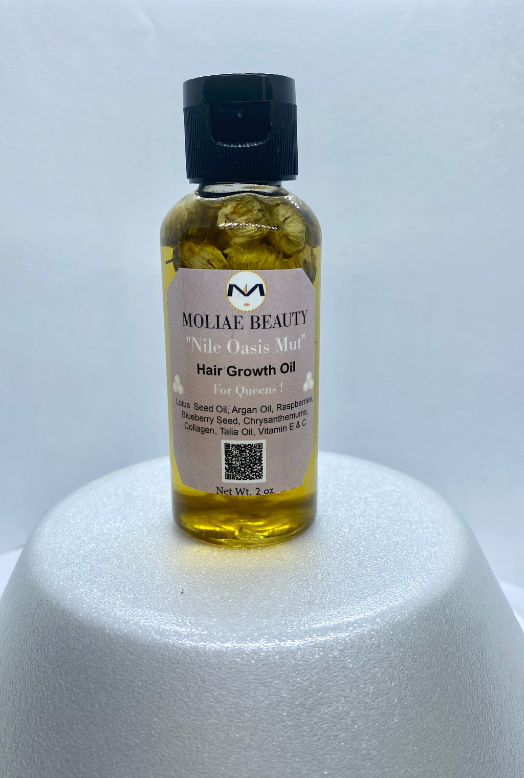 MOLIAE Beauty starter kit box featuring hair growth oil bottle and cucumber hydrating body spray — view 2