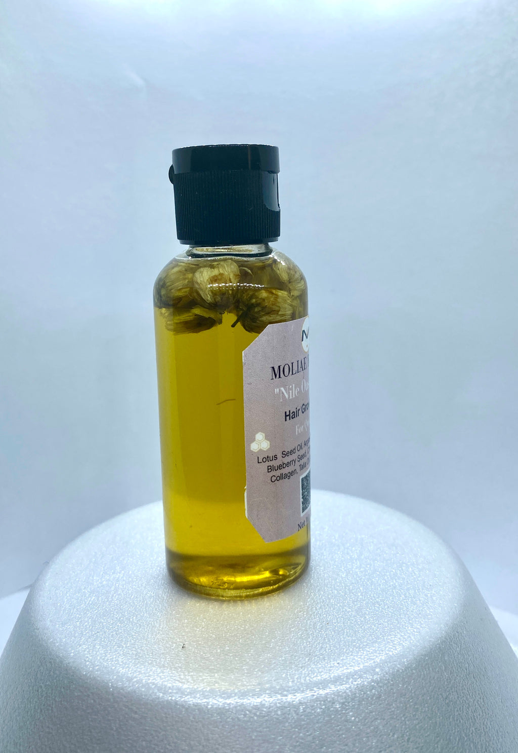 MOLIAE Beauty starter kit box featuring hair growth oil bottle and cucumber hydrating body spray — view 3