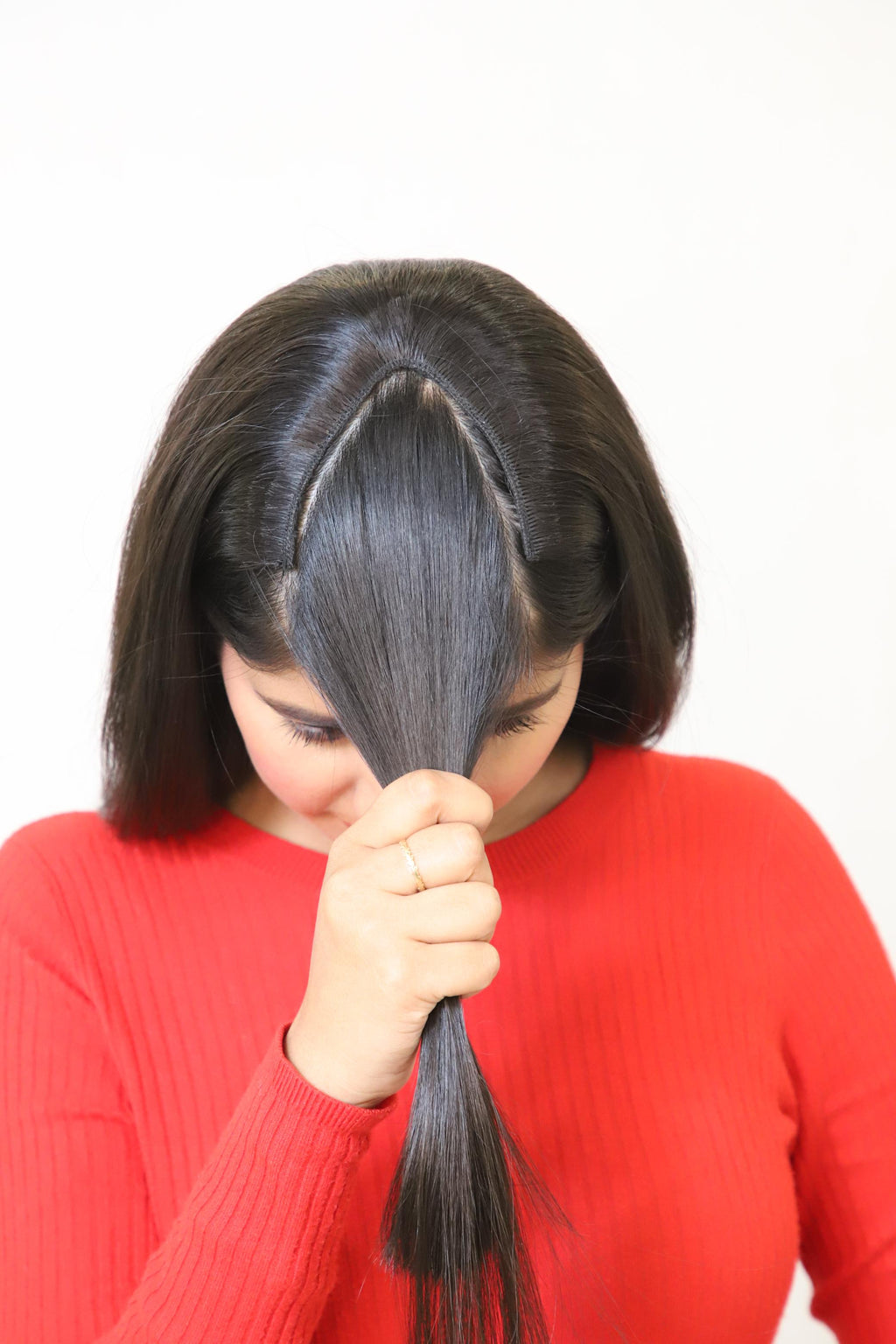 V-Shape clip-in volumizer made of thick Remy human hair showing natural layered fall styling — view 2