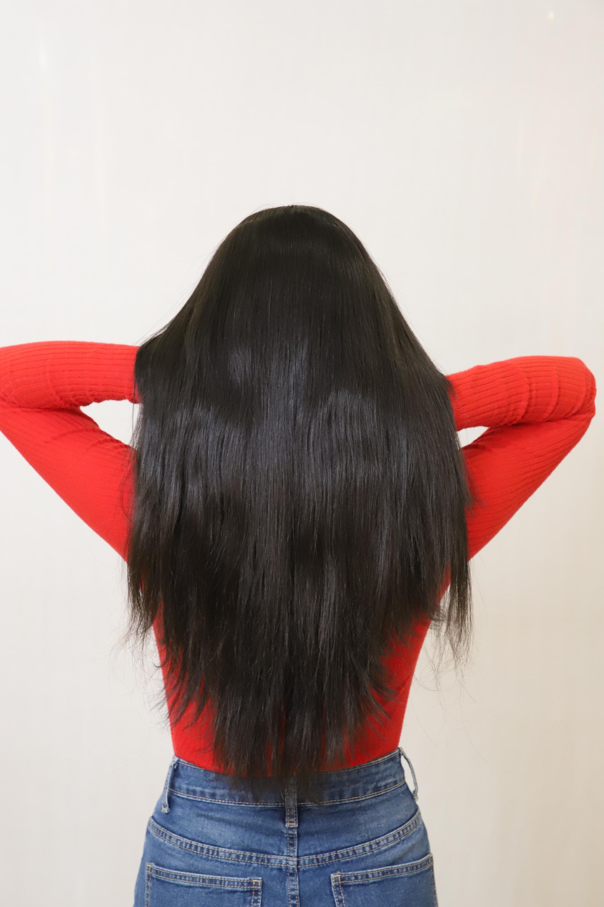 V-Shape clip-in volumizer made of thick Remy human hair showing natural layered fall styling — view 4