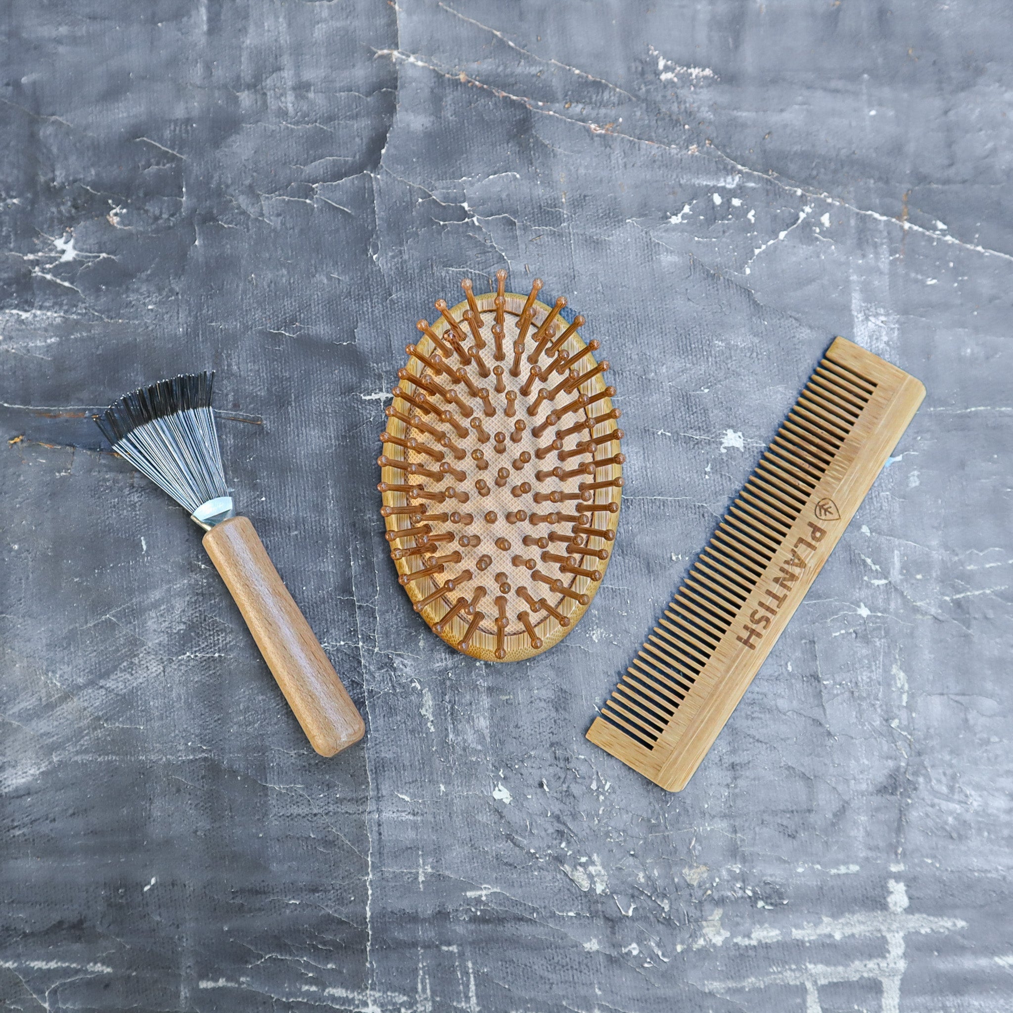 On-the-go bamboo hair brush set with detangling comb, cleaning tool, and reusable travel bag. — view 3