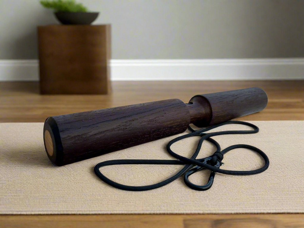 Smoked oak wrist roller with attached black rope and metal carabiner for grip strength training