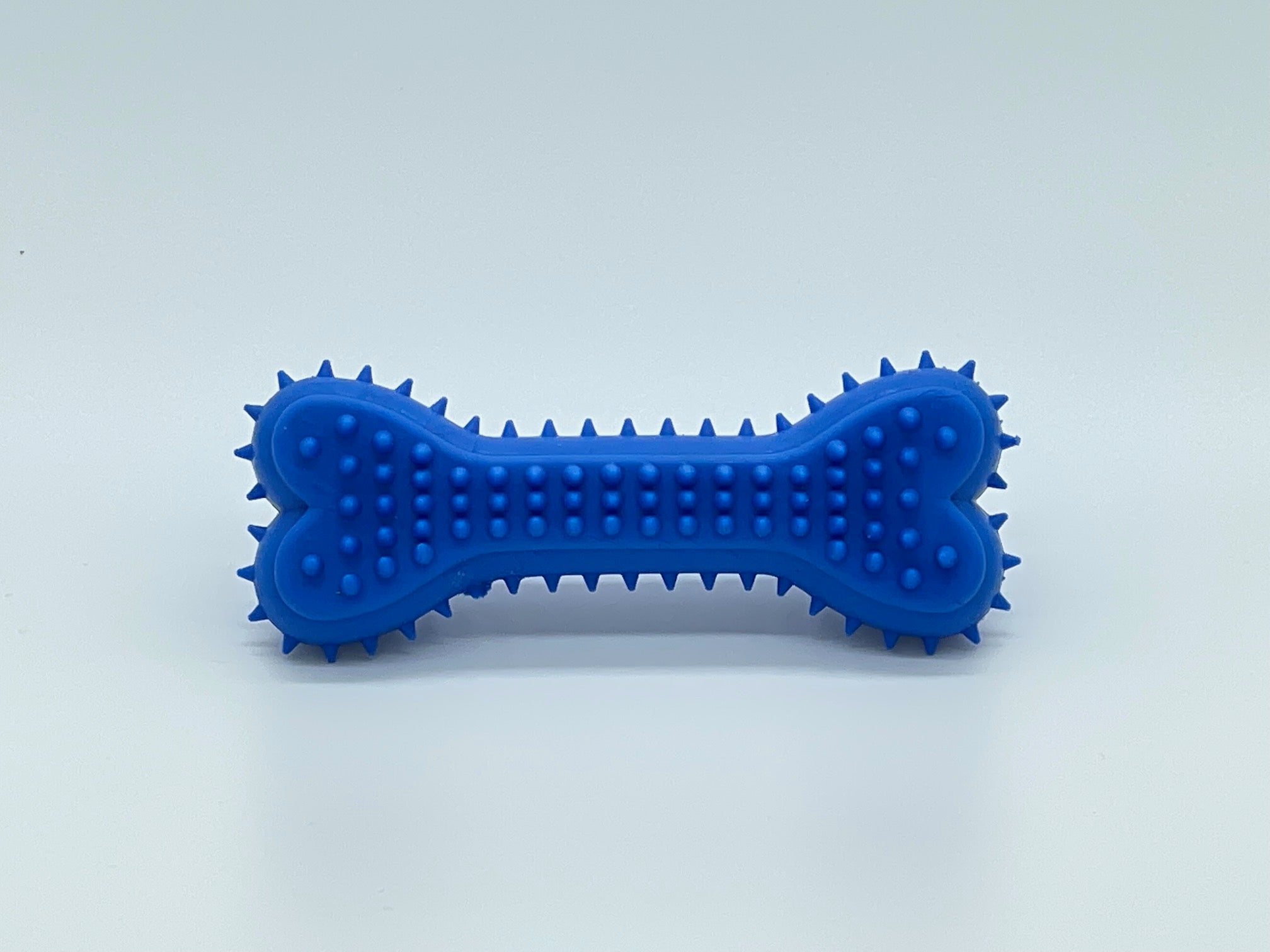 Flexible non-toxic plastic chewer bone dog toy in vibrant color for active small breeds — view 5