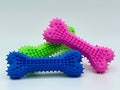 Flexible non-toxic plastic chewer bone dog toy in vibrant color for active small breeds