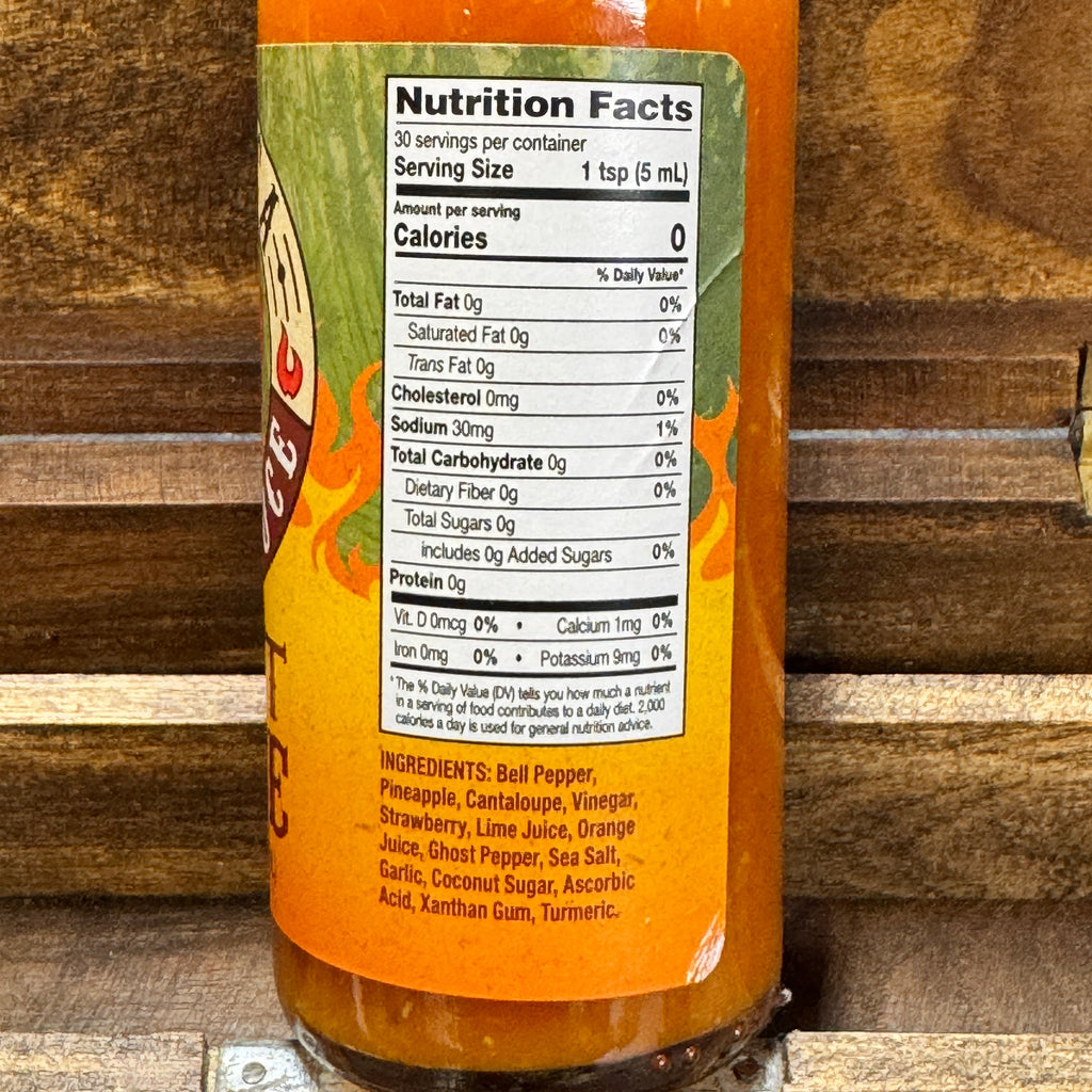Bottle of Ghost Juice hot sauce featuring a vibrant fruity ghost pepper blend — view 5