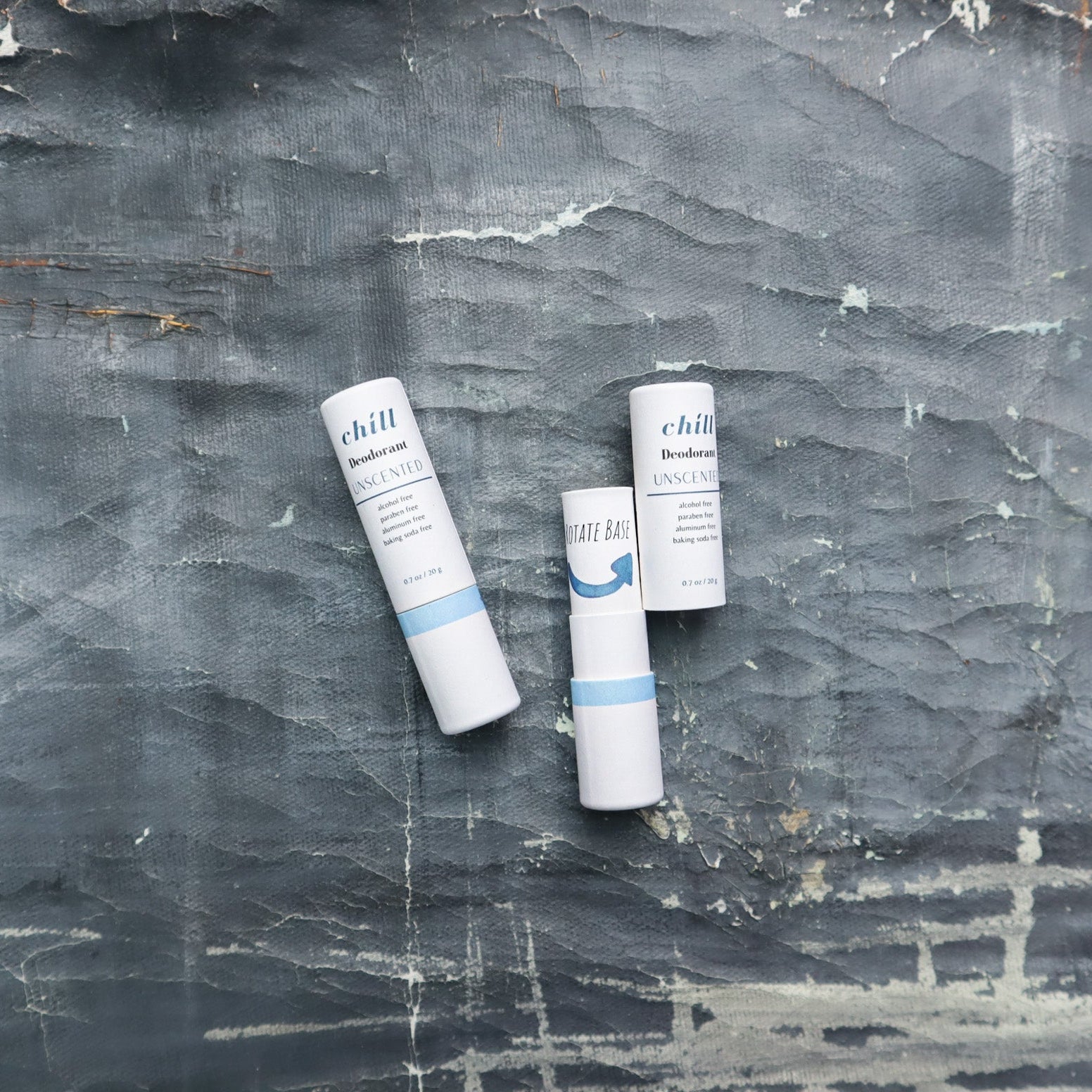 Unscented natural deodorant stick in a zero waste brown paper push-up tube — view 2
