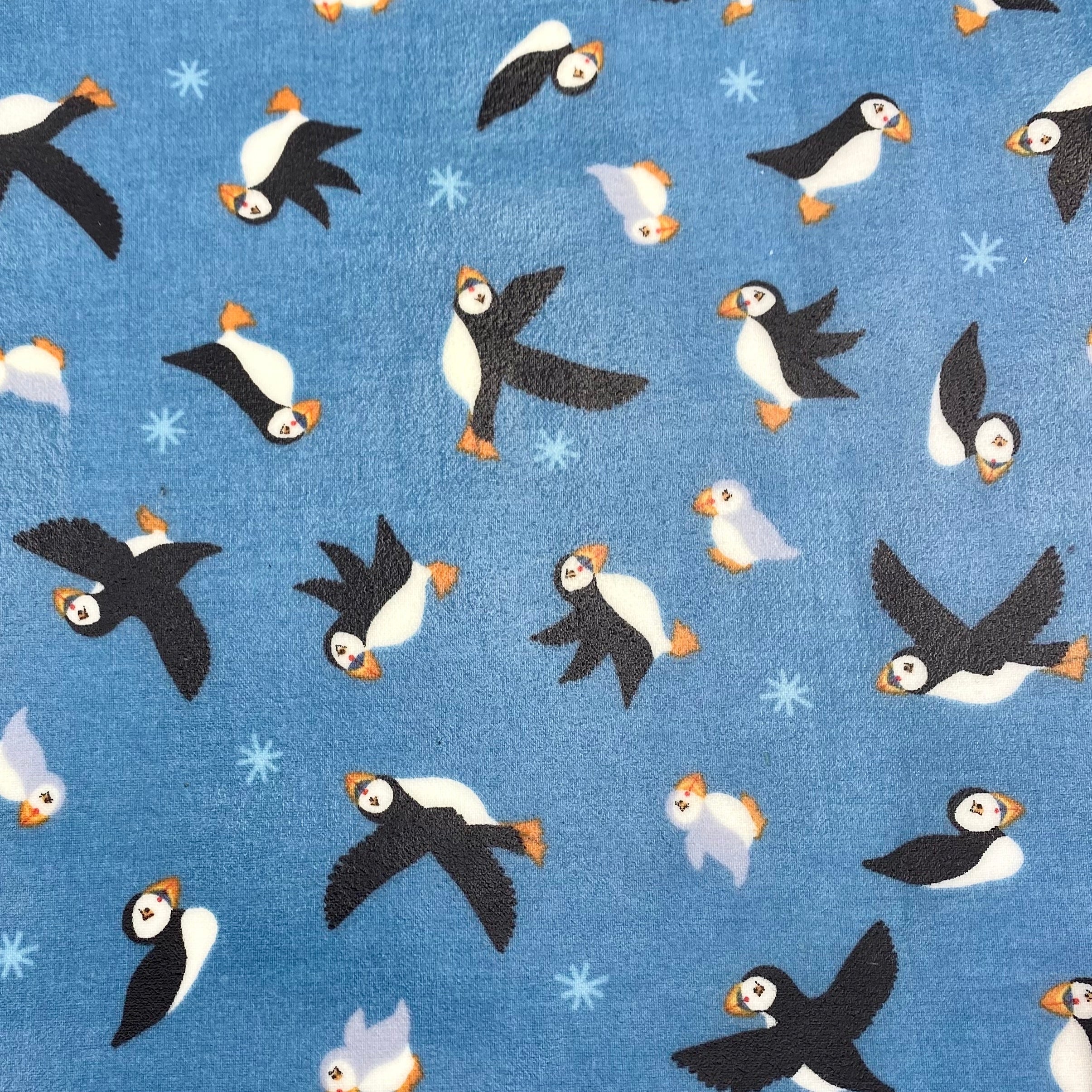 Cornish Puffin eco friendly beeswax food wrap featuring colorful coastal bird pattern covering fresh kitchen items — view 3