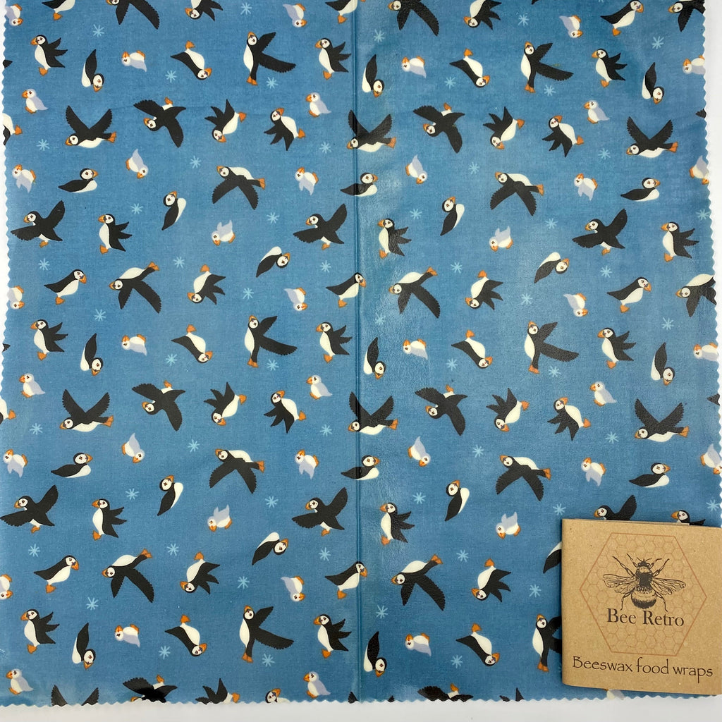 Cornish Puffin eco friendly beeswax food wrap featuring colorful coastal bird pattern covering fresh kitchen items — view 2
