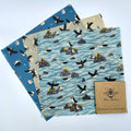 Cornish Puffin eco friendly beeswax food wrap featuring colorful coastal bird pattern covering fresh kitchen items
