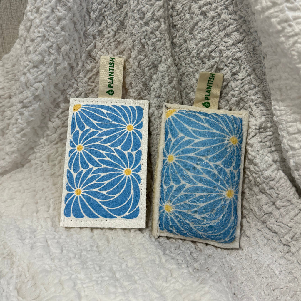 Blue Daisy compostable eco sponge with wood pulp, textured loofah, and a blue floral print pattern — view 3