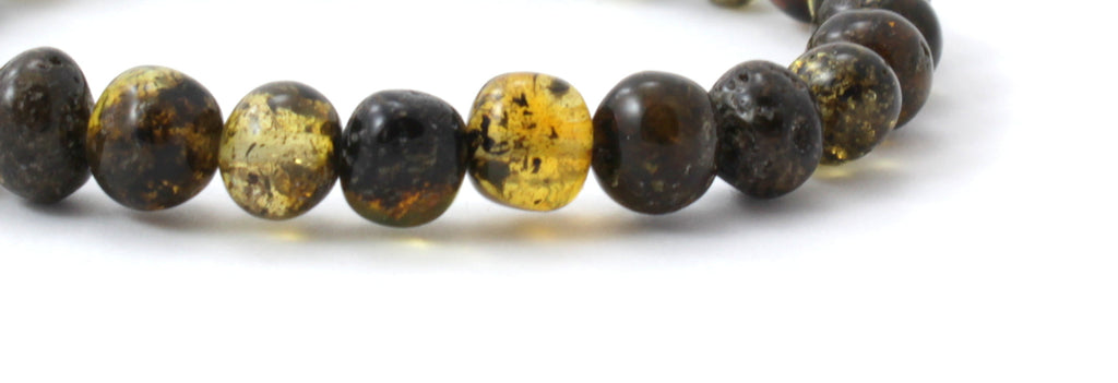 Green polished Baltic amber beaded stretch bracelet for men with oval shaped stones — view 3