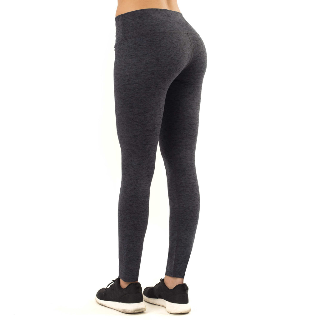 Womens athletic leggings in midnight black featuring a versatile high waistband and convenient hidden pockets