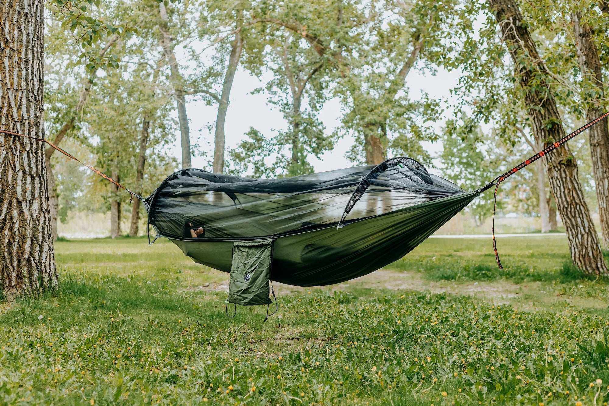 Portable camping hammock in ripstop nylon with built-in mosquito net and aluminum support poles — view 2