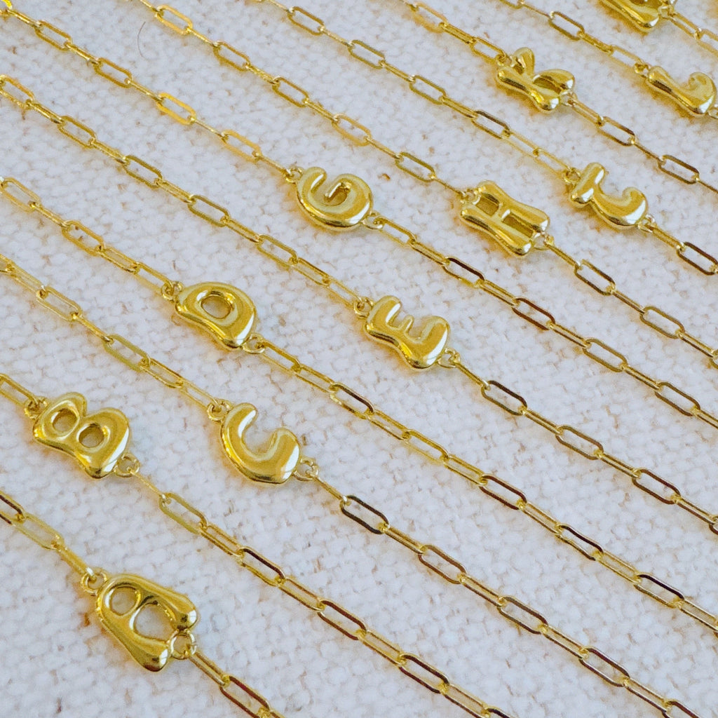 18k gold plated mini balloon initial bracelet on a delicate chain with adjustable extender