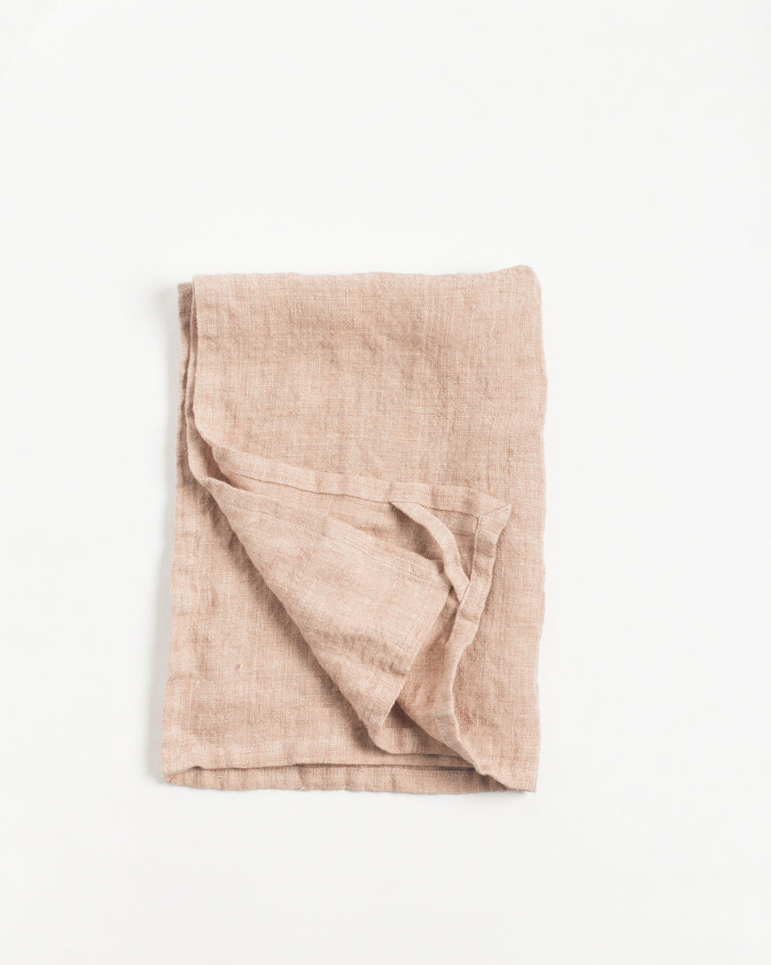 Stone washed linen tea towel folded with hemmed edges and hanging loop, premium European flax — view 3
