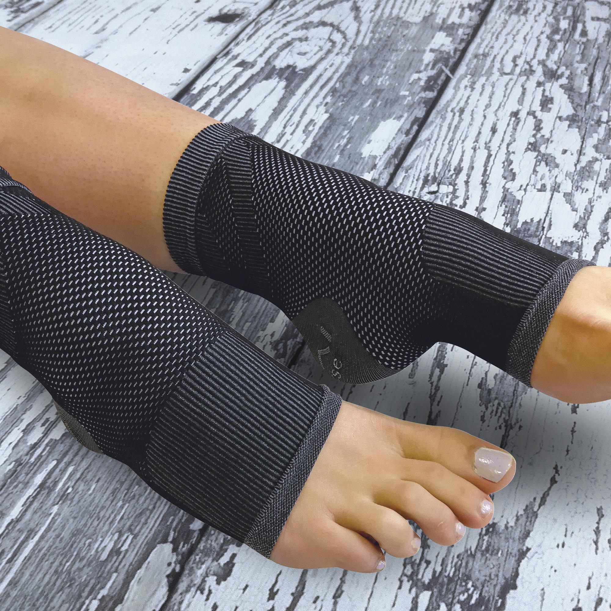 Grey and black mesh plantar fasciitis compression sleeve socks featuring targeted arch support — view 4