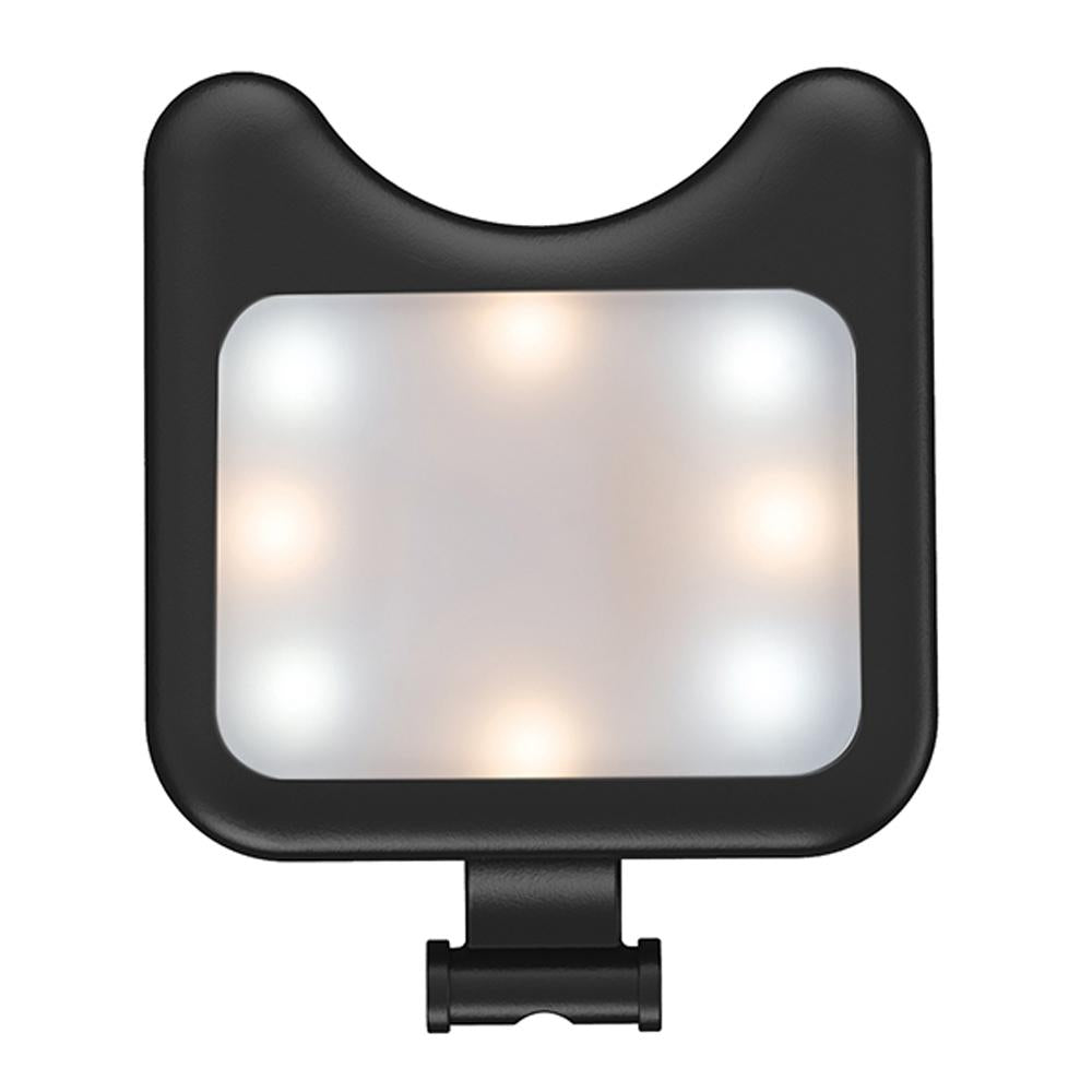Black clip-on universal phone camera lens and selfie LED light attached to a smartphone — view 4