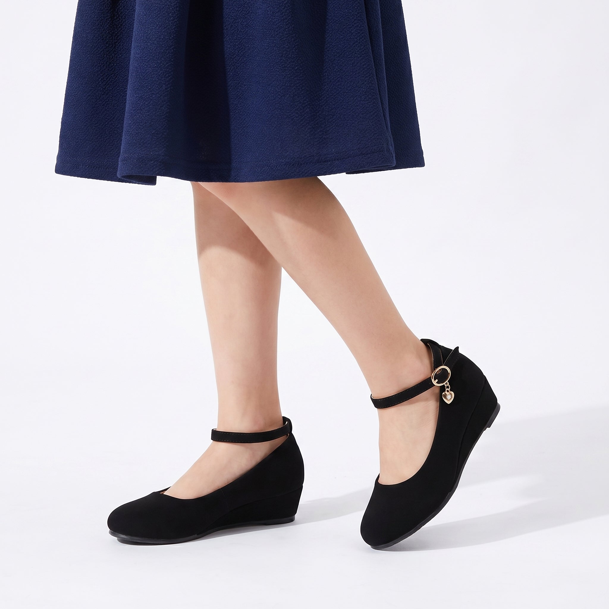 Girls faux leather wedge shoes with a big bow detail, perfect for elegant formal occasions. — view 3