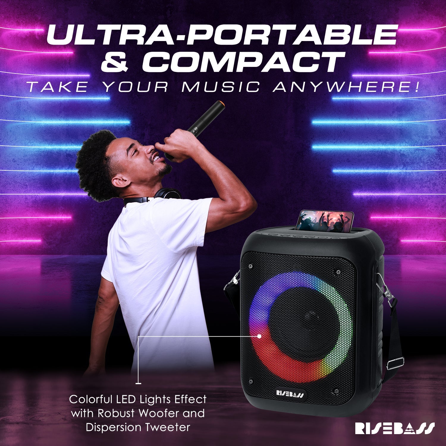 Compact portable karaoke machine in black with LED lights and two wireless microphones — view 4