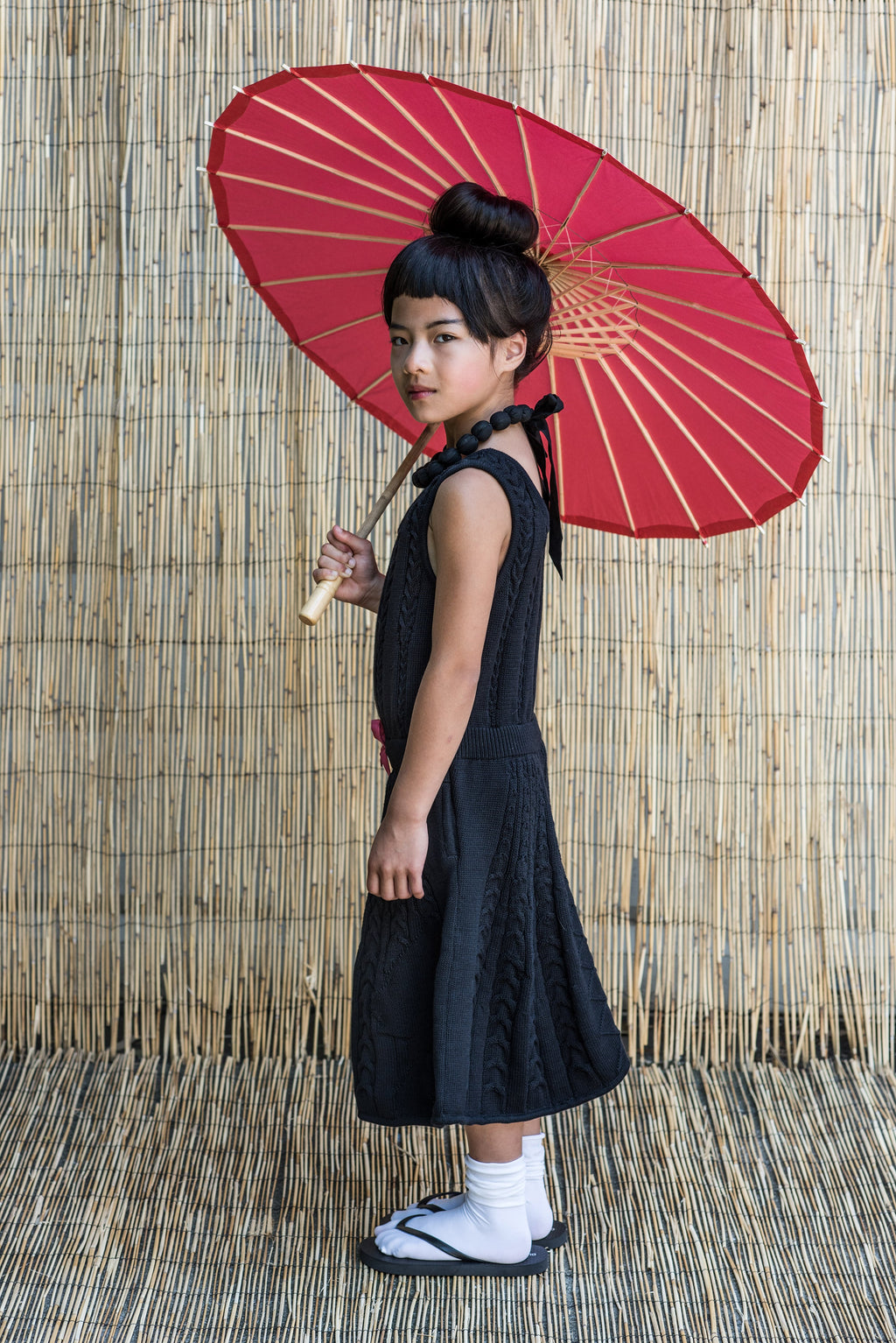 Black cable knit dress for girls in sleeveless midi style with organic cotton and drawstring waist — view 4