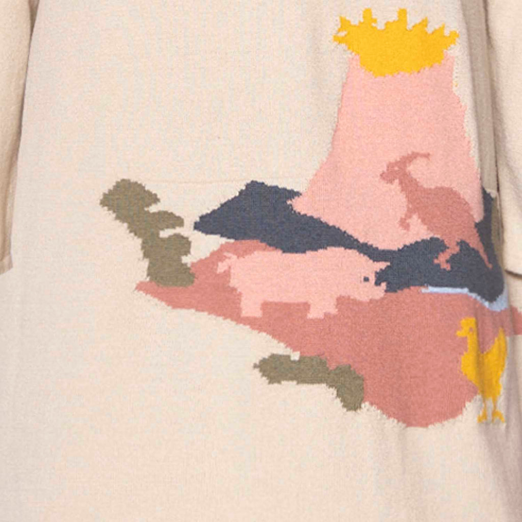 Beige knitted dress for girls made of organic cotton featuring a fun animal and dinosaur print — view 3
