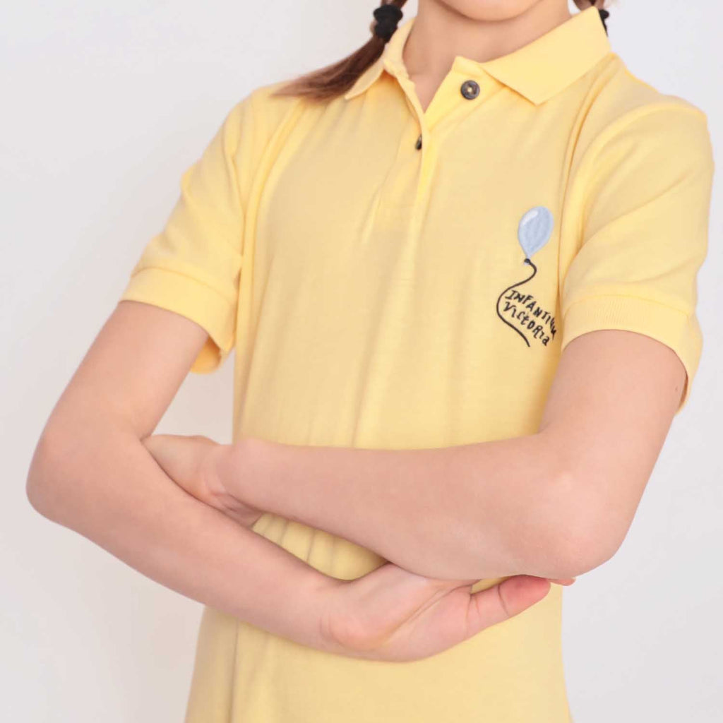 Yellow polo dress for girls in organic cotton with coconut shell buttons and front pocket — view 3