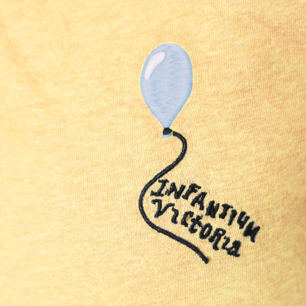 Yellow polo dress for girls in organic cotton with coconut shell buttons and front pocket — view 4