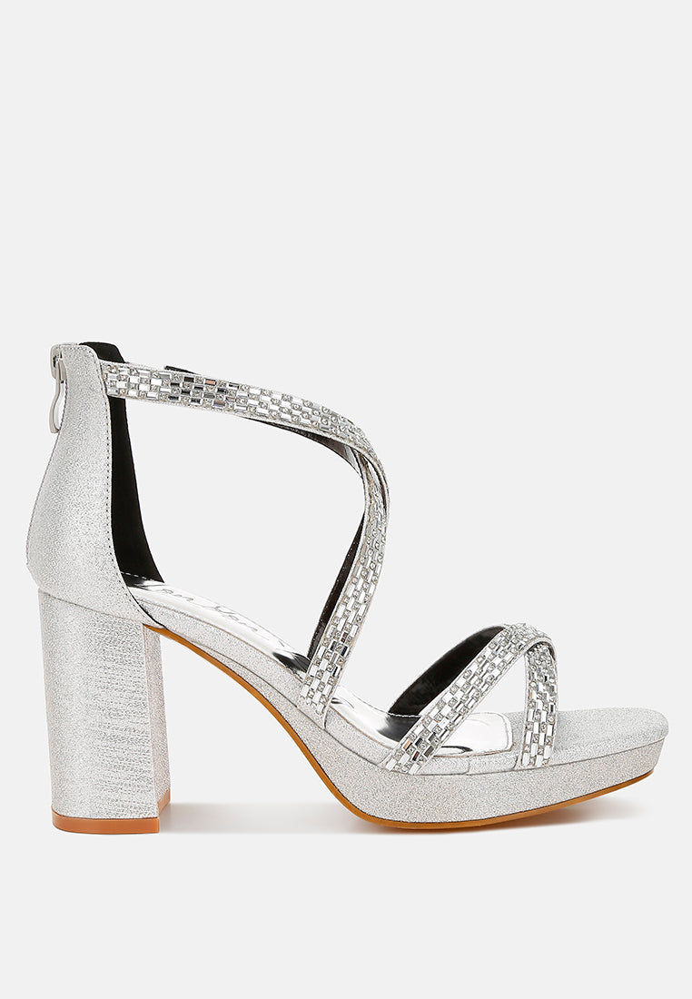 Rhinestone embellished strappy sandals with three-inch block heel, zipper closure, and shimmering fabric finish