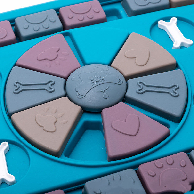Interactive dog food dispenser toy in blue plastic with sliding puzzle panels and treat compartments — view 5