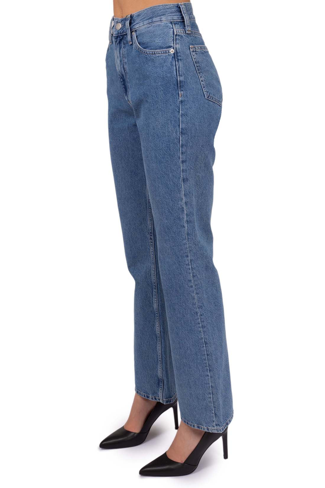 Women's medium-light wash bootcut jeans with five pocket design and logo details — view 16
