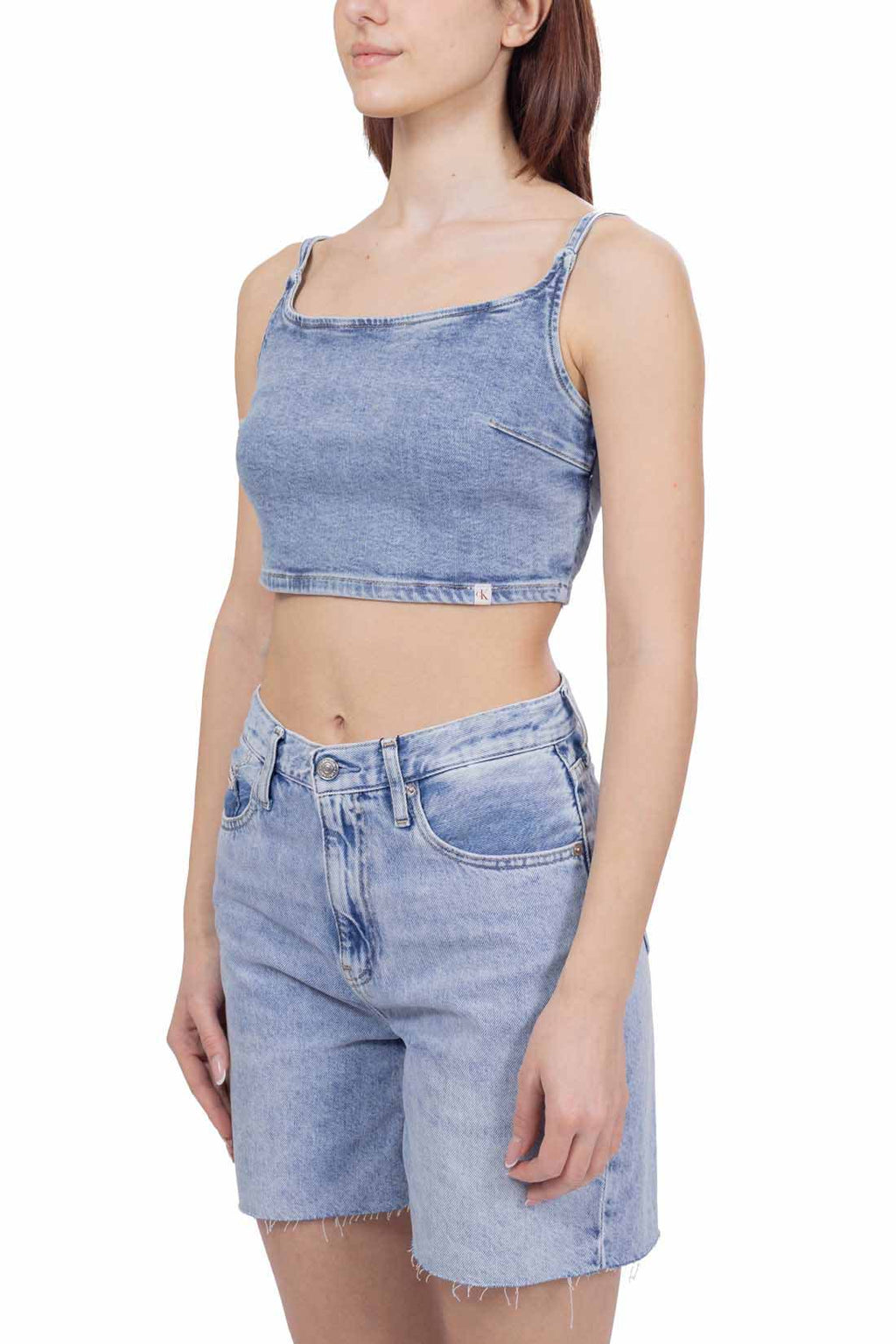 Women's light wash denim bralette crop top with thin straps and back zipper fastening — view 6