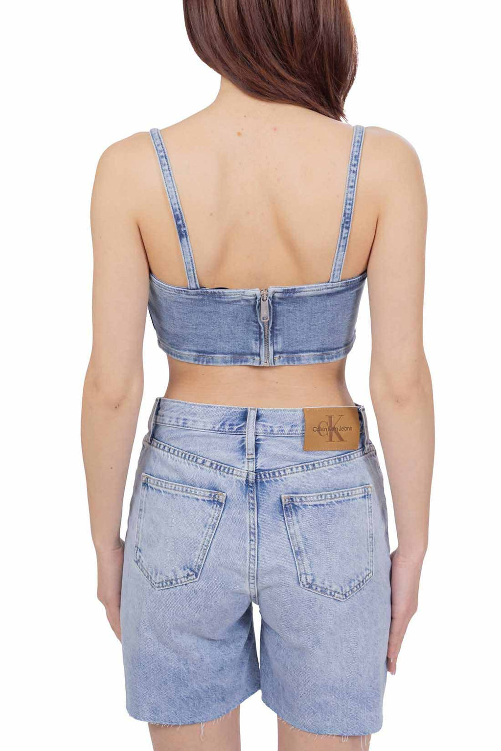 Women's light wash denim bralette crop top with thin straps and back zipper fastening — view 7