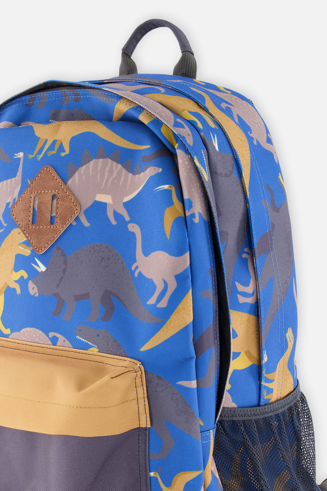 Kids backpack featuring blue dinosaur print padded straps and water bottle pocket in recycled polyester — view 5