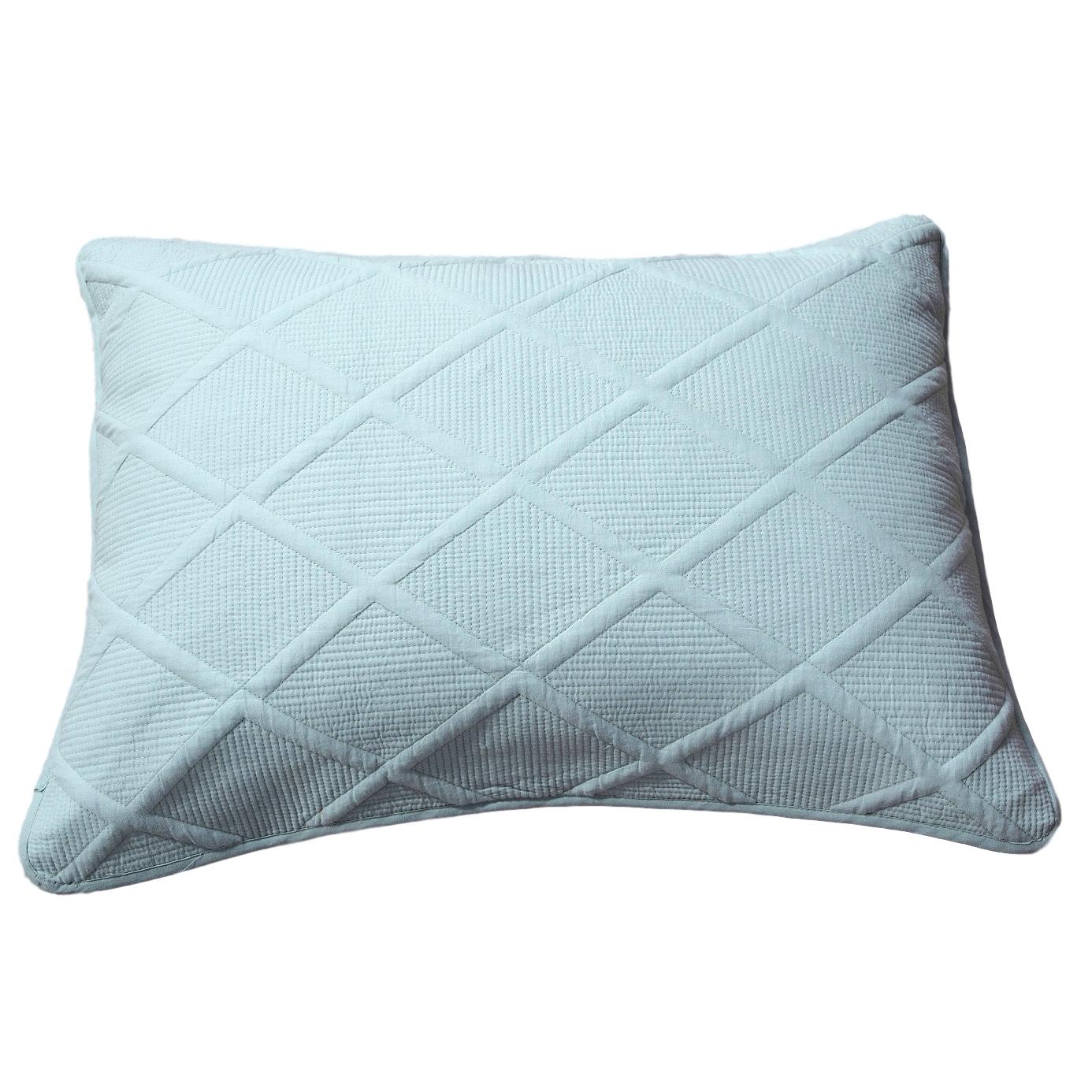 Seafoam blue cotton diamond pillow sham with geometric matelasse stitching on a modern bed setup