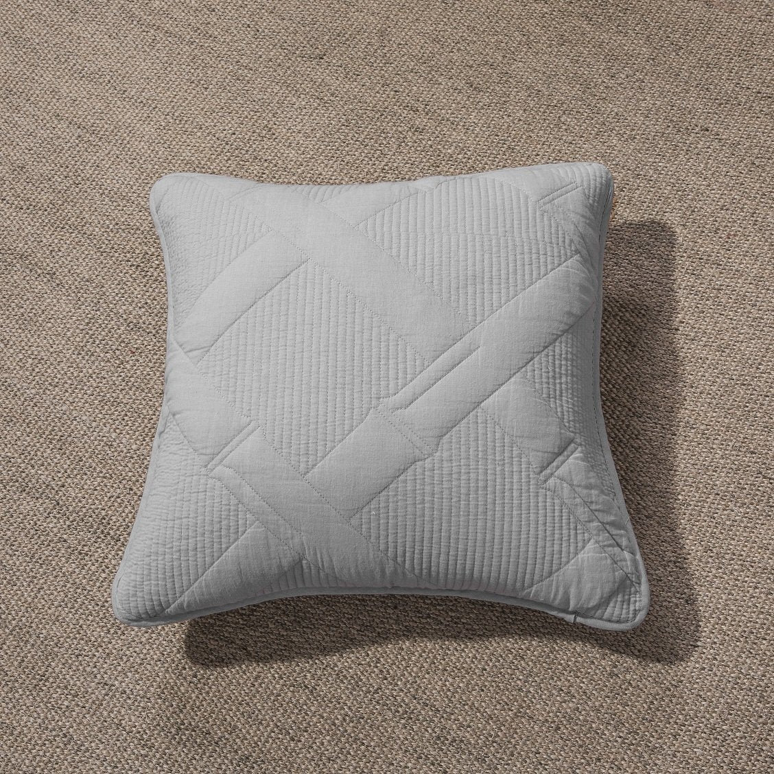 Light grey pastel quilted cotton cushion cover euro sham with geometric diamond stitching. — view 3
