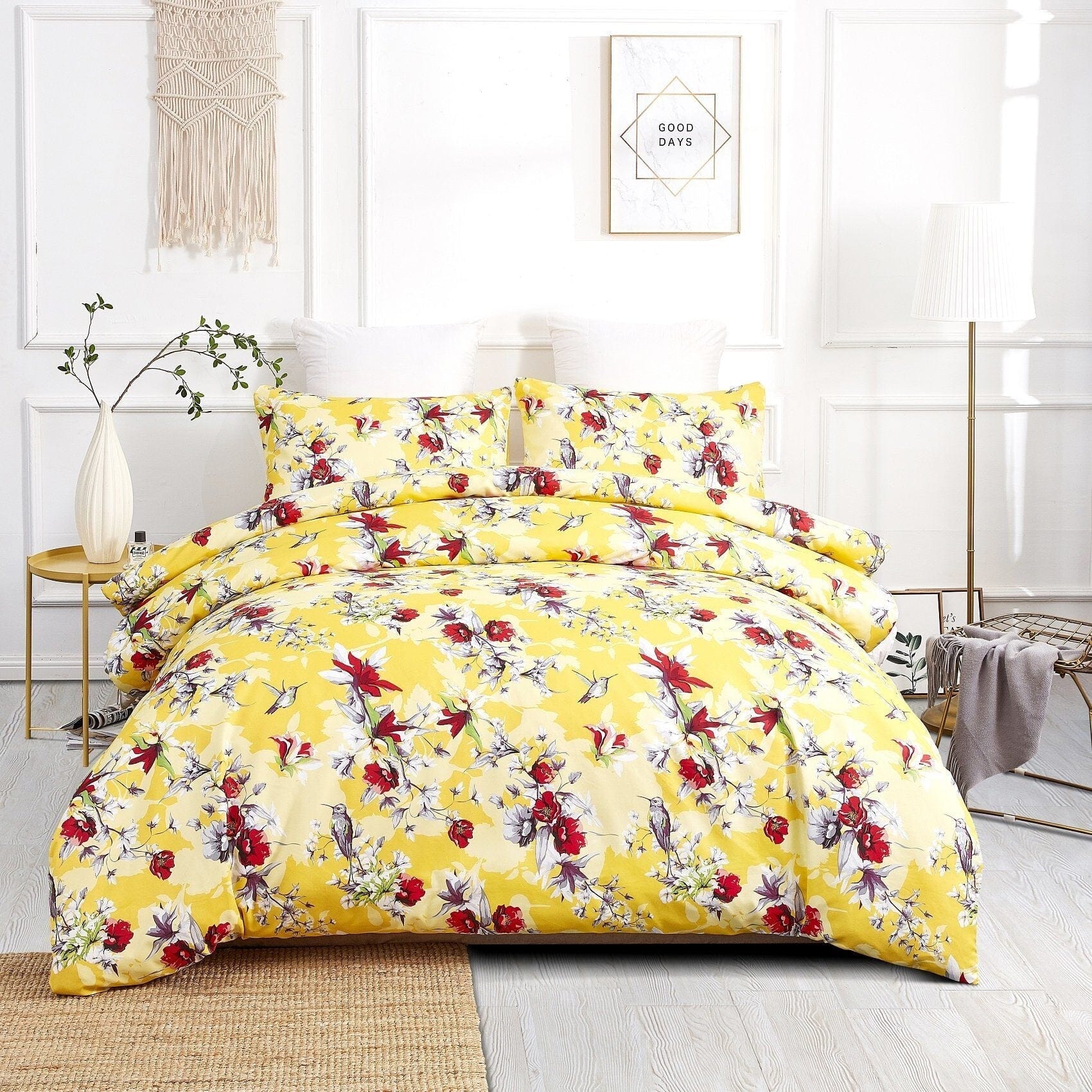 Sunshine yellow floral duvet cover set with hummingbird pattern and matching pillowcases.